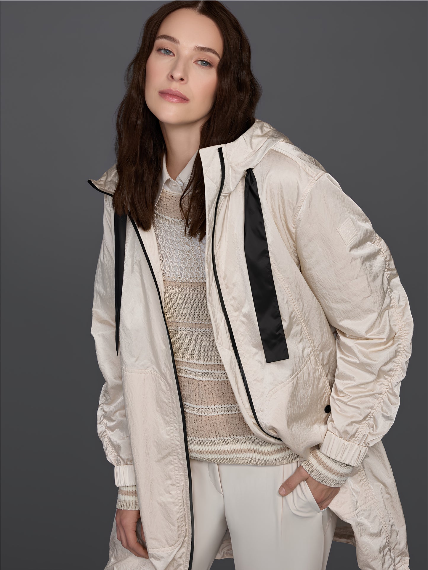 Shiny coat with contrasting details